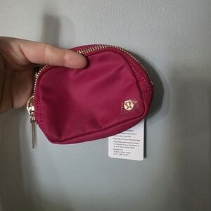 lululemon athletica Hot Pink Coin Pouch with Gold Logo